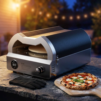 12 In. Propane Pizza Oven, Outdoor Pizza Oven in Black with Rotating Pizza Stone, Glove and Pizza Cutter — Studio Shot